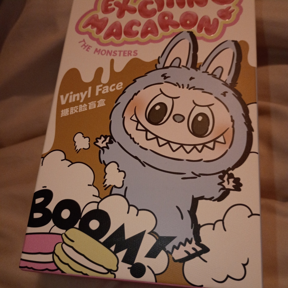 Vinyl Face Toy with Blue and White Design